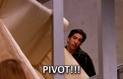 gif of ross from friends holding a sofa and saying pivot
