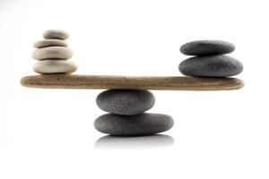 Photo of rocks balanced on each other, indicating the balance between SEO and PPC