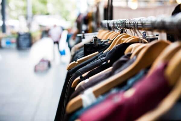 photo of a rack of clothing in a store